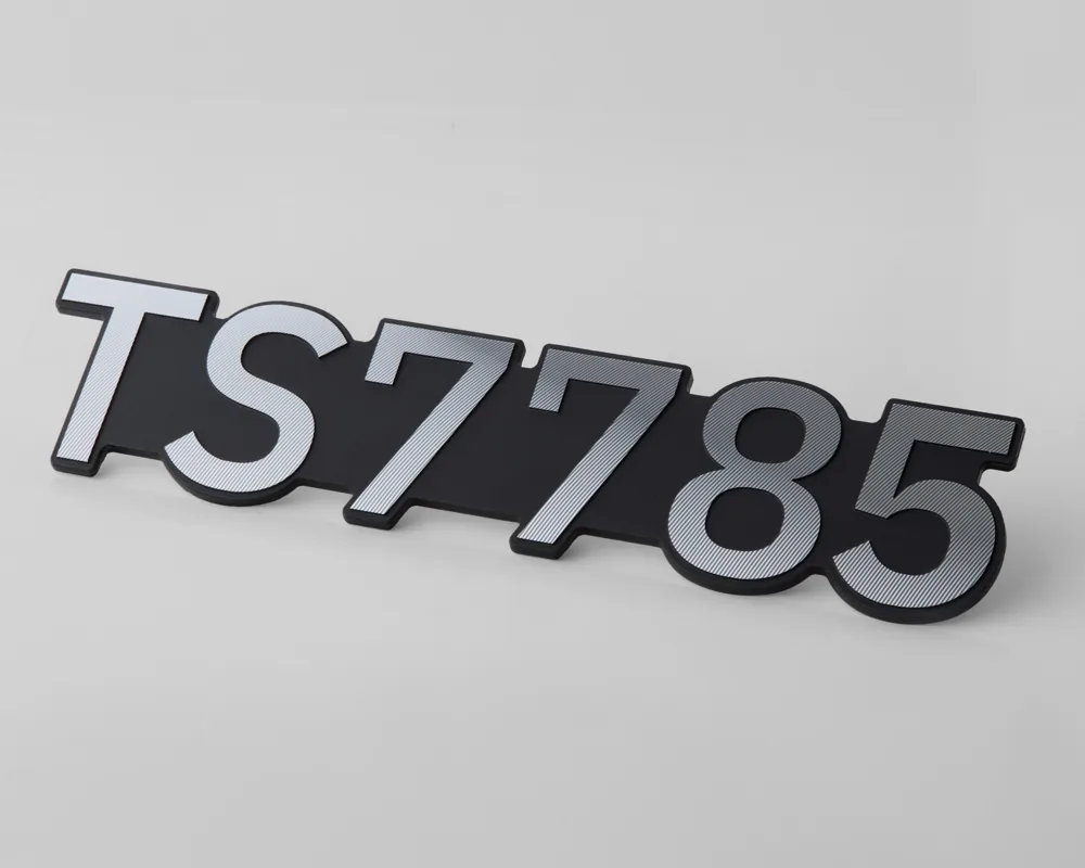 TS7785 aluminum model badge