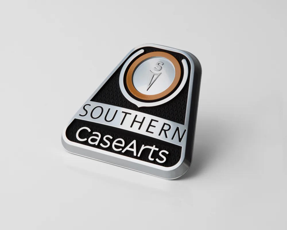 Electroformed nickel badge with black fill