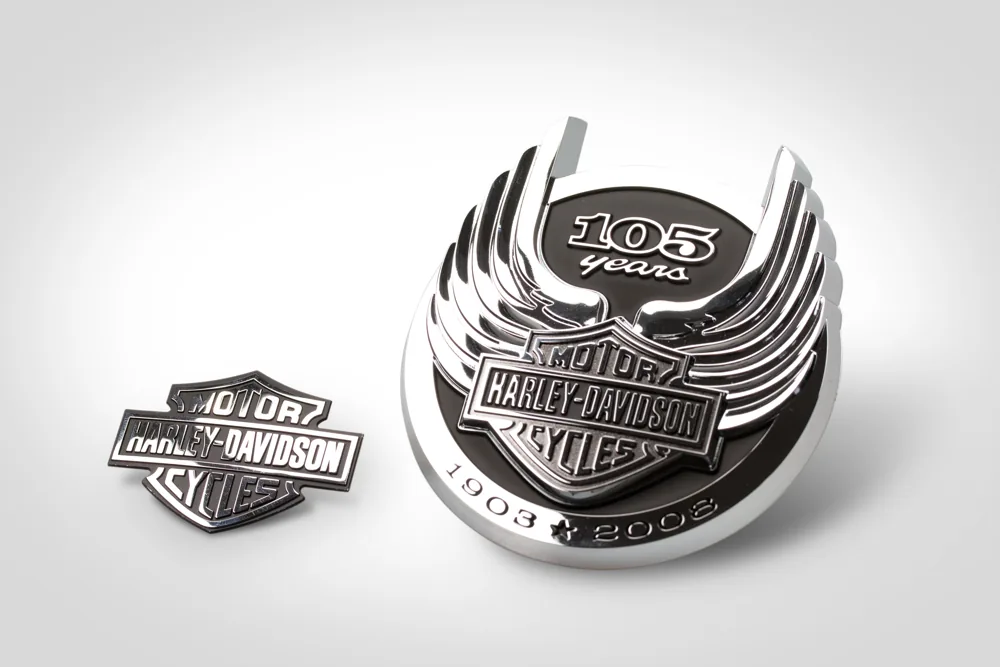 Chrome zinc die-cast emblems with winged logo